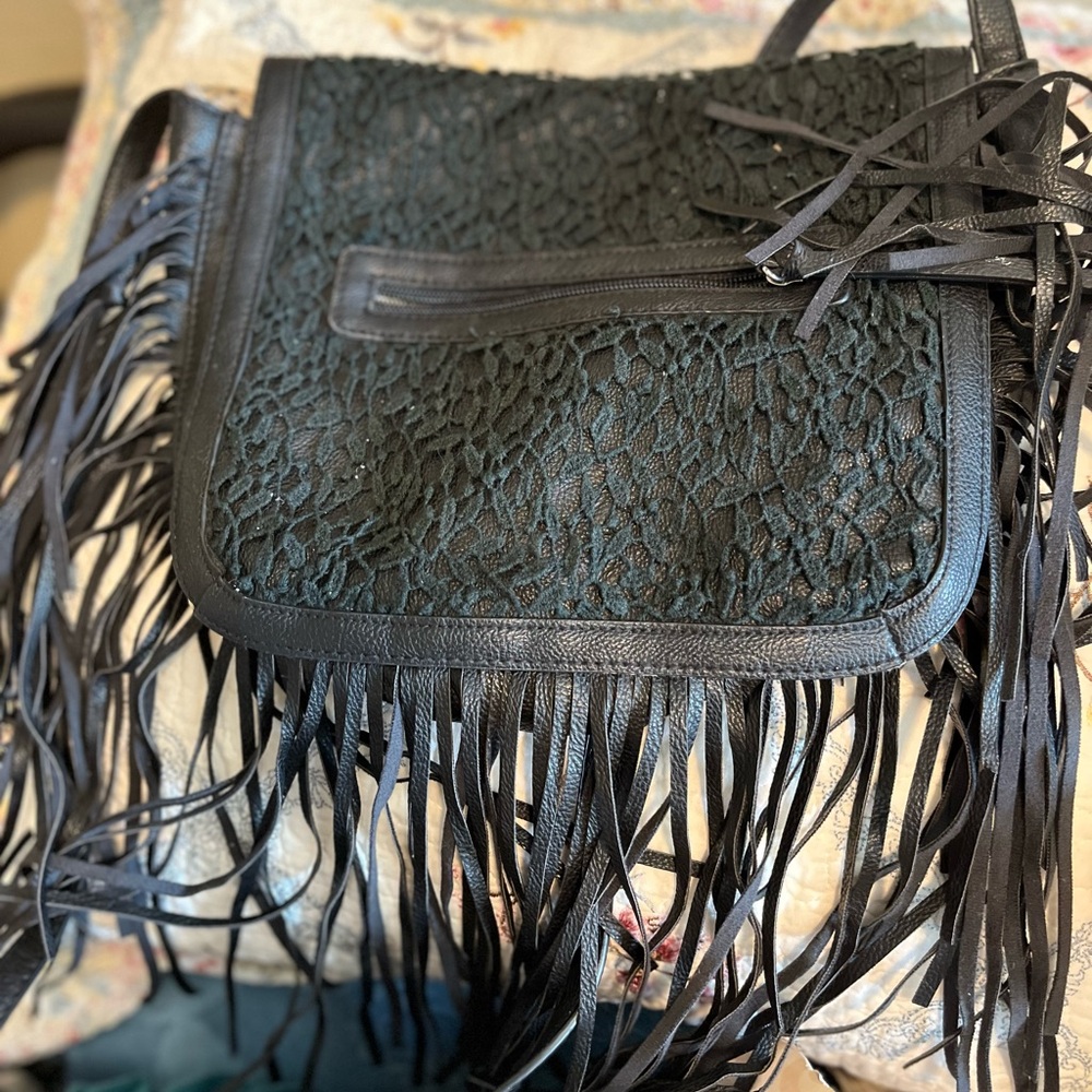 Steve Madden Black Crossbody Bag with Fringe and Flap Closure